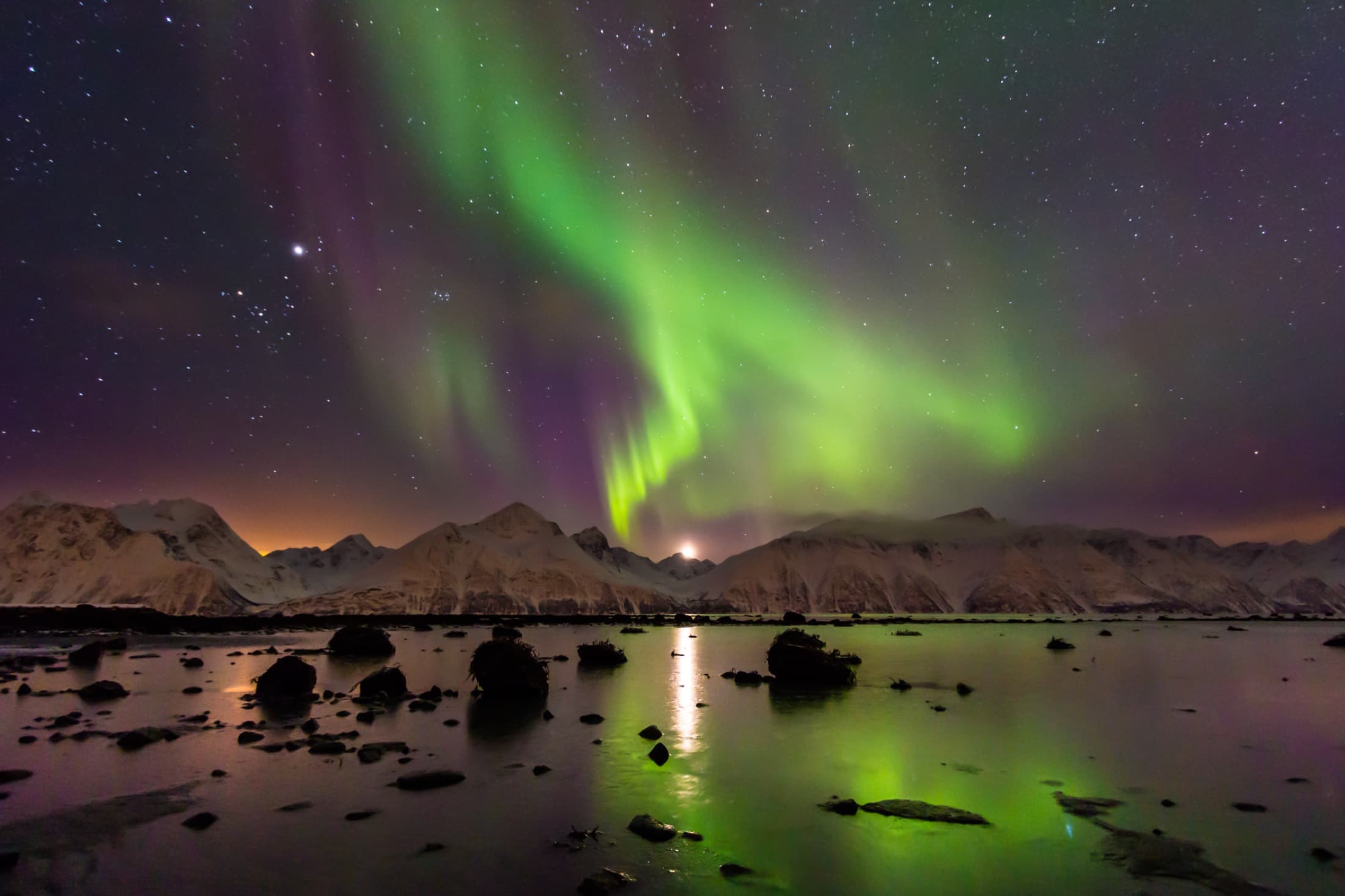 The northern lights over a Norwegian coastline